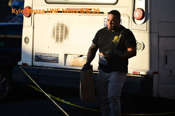 An NYPD officer carries evidence bags after collecting evidence including a shell casing at the scene where a 41-year-old man was fatally shot aboard an MTA Bx36 bus in the area of White Plains Road and East Tremont Avenue, Bronx, New York, USA, June 8, 2026. Monday afternoon at approximately 2:33 PM the fatal shooting transpired aboard the MTA bus. There are no arrests and the investigation is ongoing. The identity of the deceased is being withheld pending proper family notification.