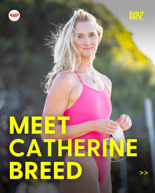 Run It Back carousel slide. Catherine Breed stands outdoors in a pink one-piece swimsuit, blonde hair blowing, holding goggles in her hands, looking off-camera with a slight smile. Green hillside background. Bold yellow text reads "MEET CATHERINE BREED." Allez! Sports and Run It Back logos.
