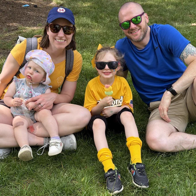 Family enjoying ice cream outside.