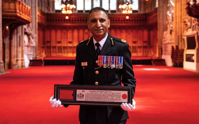 City of London Police Commander Umer Khan OBE pictured at Guildhall, shortly after receiving the Freedom of the City of London today, in recognition of his exemplary service to policing and community cohesion.