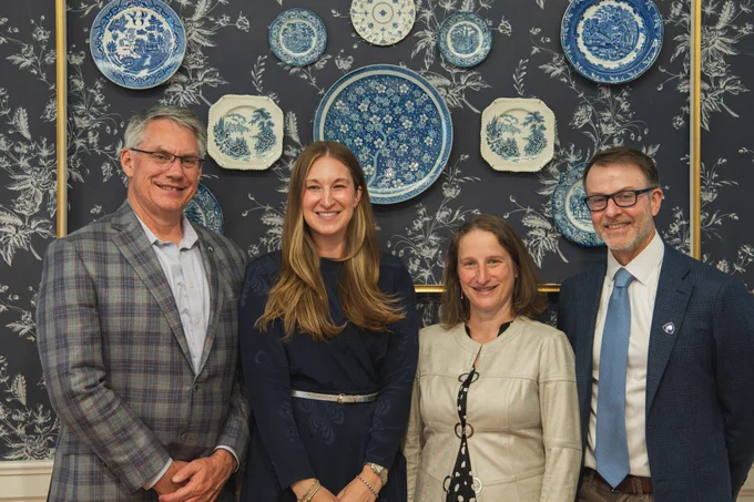 Christopher Cabell, Jocelyn Fitzgerald, and E. John Wherry posing for a photo with Dean Tracy Langkilde after receiving the 2026 Outstanding Science Alumni Award. 