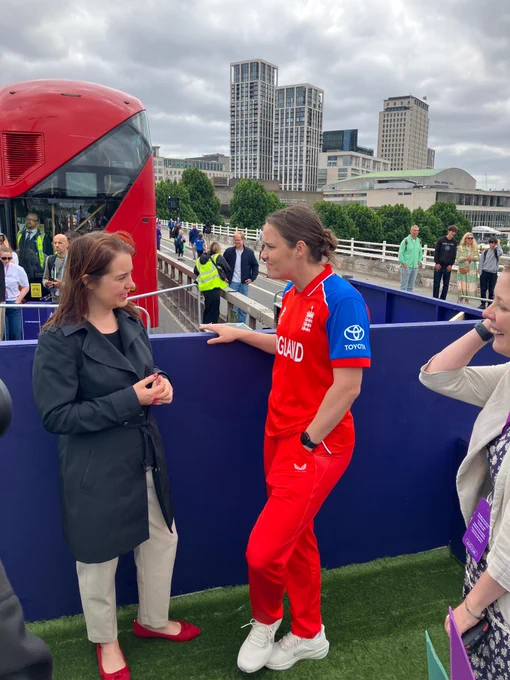 Minister Peacock talking to England cricket player