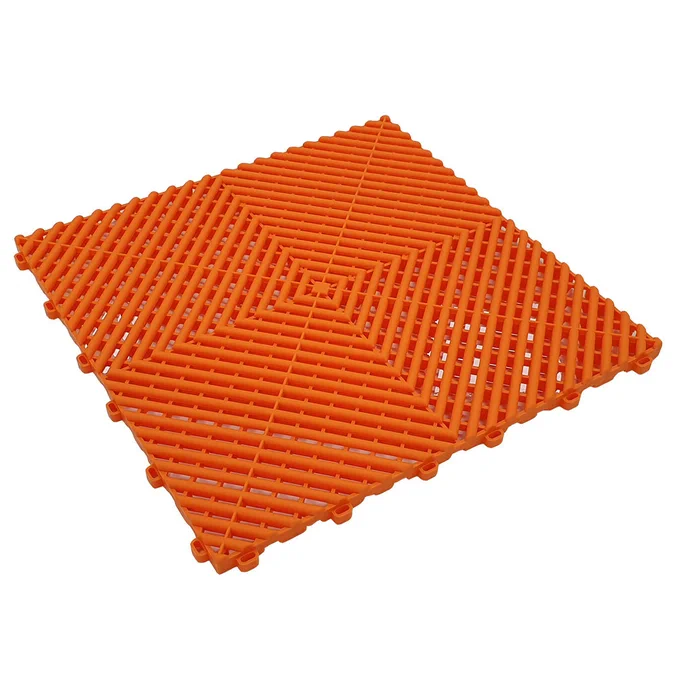 This Orange MotoVent Tile is the ultimate modular tile, renowned for its superior strength and exceptional performance. With tile dimensions of 400mm x 400mm x 18mm, it offers a perfect fit for a wide range of applications. What sets MotoVent Tiles apart is its unique construction as the only solid flooring tile created with a 4-point injection mould, ensuring unmatched durability and reliability. These Orange MotoVent Interlocking Tile are a perfect solution for Garages, Workshops, Warehouses, Gyms, Factories, Commercial and Temporary Spaces making your flooring space stand out.