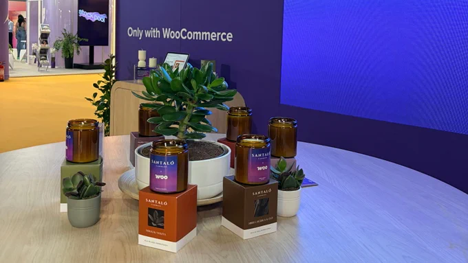 A display of candles at the Woo booth at Shoptalk Europe.