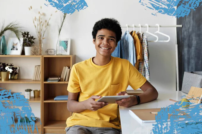 Image of a smiling child using a device