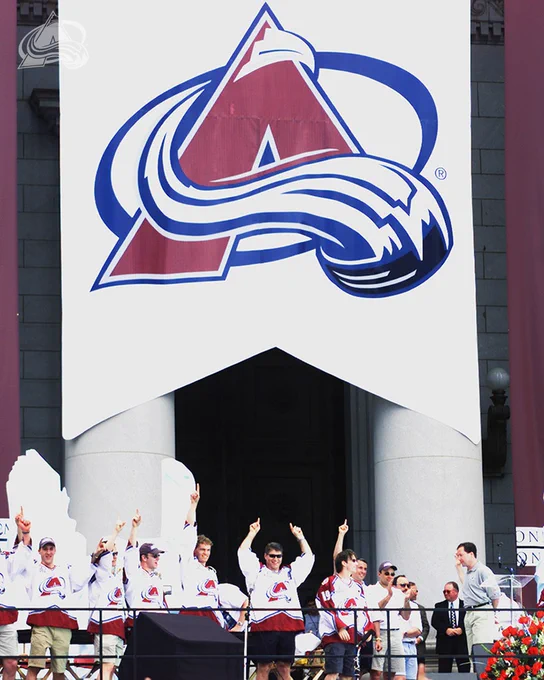 The Colorado Avalanche Stanley Cup team on stage in Denver celebrating the victory. 