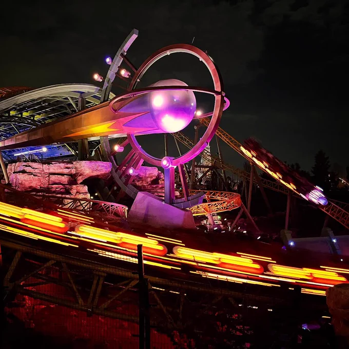 Photo of Stardust Racers at night. 