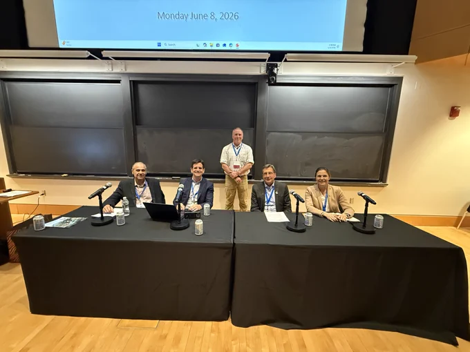 The sustainability panel moderator and panelists seated before the start of their session. From left to right: Sorab Panday, Russell McGlothlin, Matt Tonkin, Doug Bartlett, and Emily Lodolce.