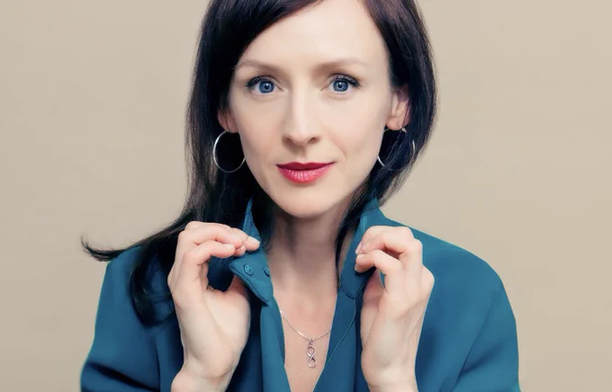 A woman in blue shirt. 