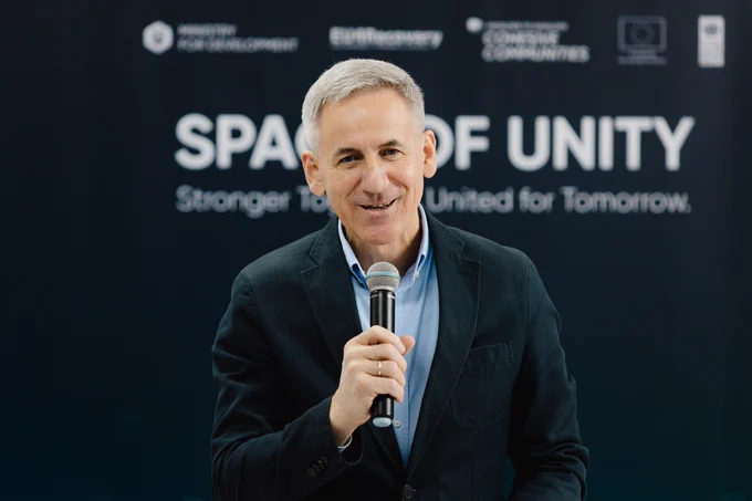 Vasyl Karpusha, Rector of Sumy State University, speaks during the interregional “Space of Unity – Shared Solutions” exchange visit. The event, supported by the European Union and UNDP, brought together community representatives to strengthen partnerships and local resilience.