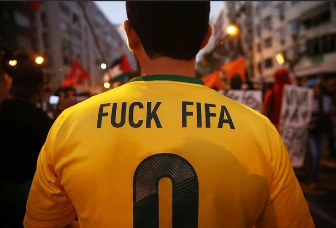 Footballer with "Fuck Fifa" text on shirt