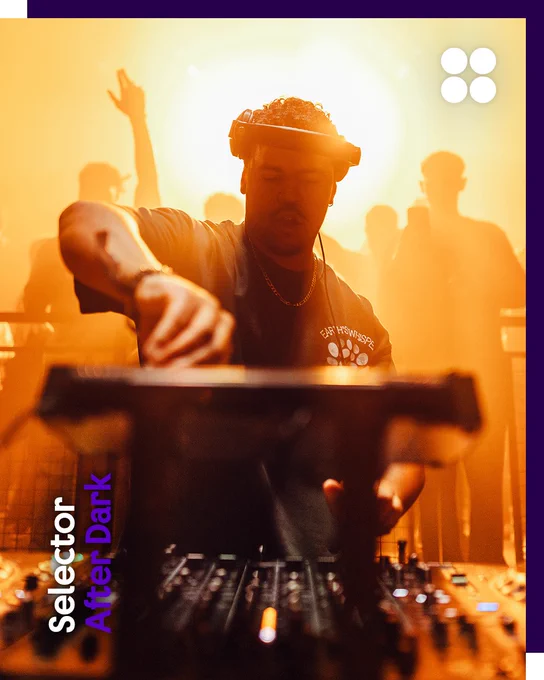 A DJ, Rio Tashan, is performing at a vibrant event, surrounded by an illuminated atmosphere, with silhouettes of attendees in the background. The image has a purple border with the text "Selector After Dark" in the bottom left corner.