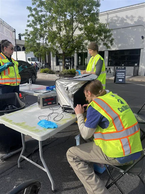 CalRecycle teams conduct a waste audit, examining to-go food containers from the recent Love Modesto event.