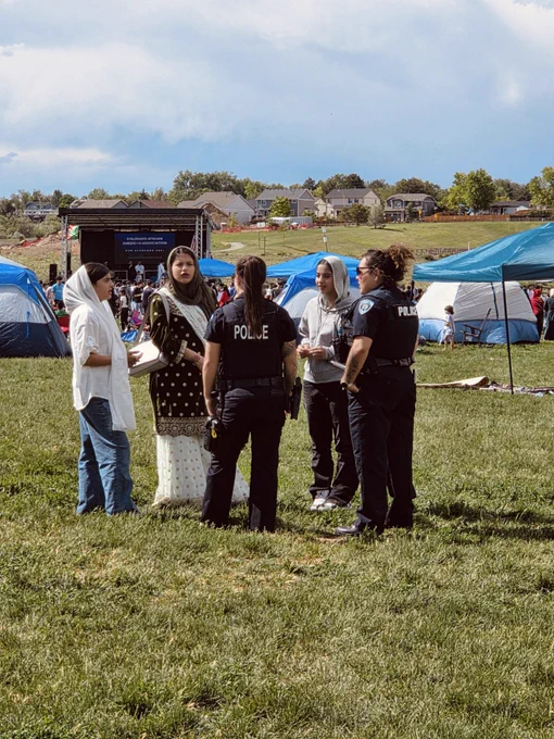 Officers speaking with festival attendees