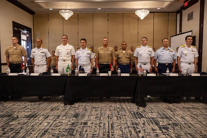 Marine Forces South, U.S. Navy, U.S. Coast Guard, and Brazilian military leaders stand during an official Maritime Staff Talk session.