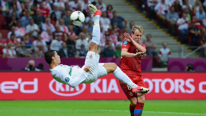A bicycle kick seems like an appropriate picture....
