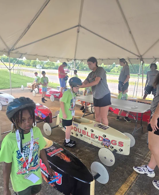 Lady Toppers helping at the Soap Box Derby
