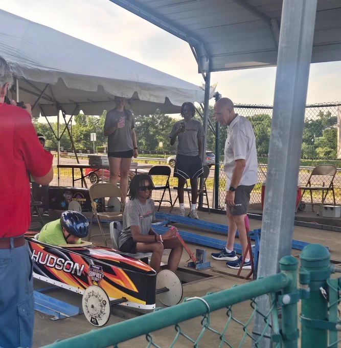 Lady Toppers helping at the Soap Box Derby