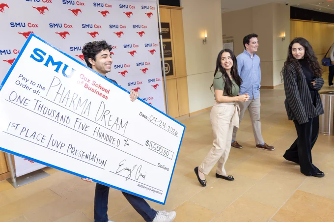 Pharma Dream founders Maria Pineda Pedraza, Madison Arroyo, Spencer Brooks and Talal Hussain, receive $1500 for their first-place pitch.
