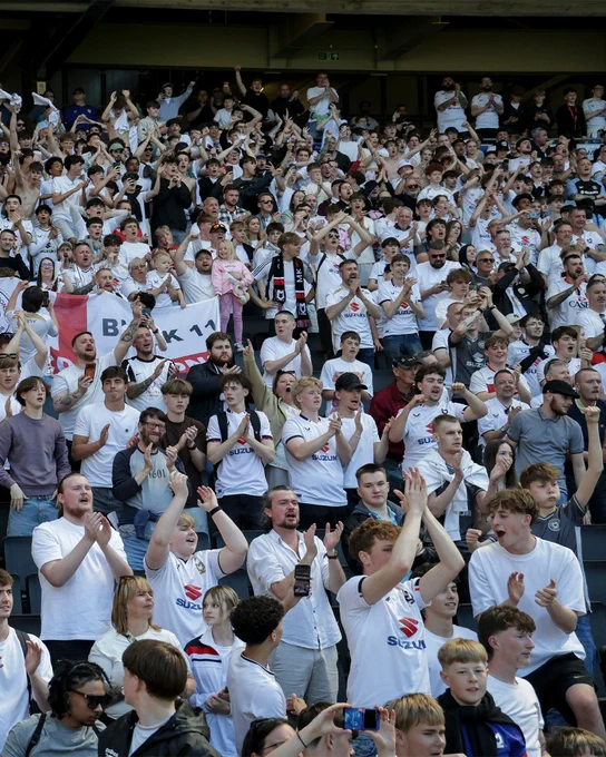 Image of MK Dons fans.