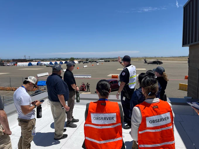 Participants and volunteers at the California Army National Guard Base in Mather.