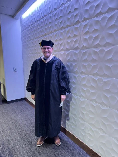 Mike in his cap and gown before the speech. 