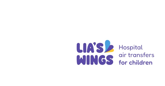 Logo for Lia's Wings. The text reads, "Lia's Wings" in purple with a blue and orange wing design, followed by "Hospital air transfers for children.