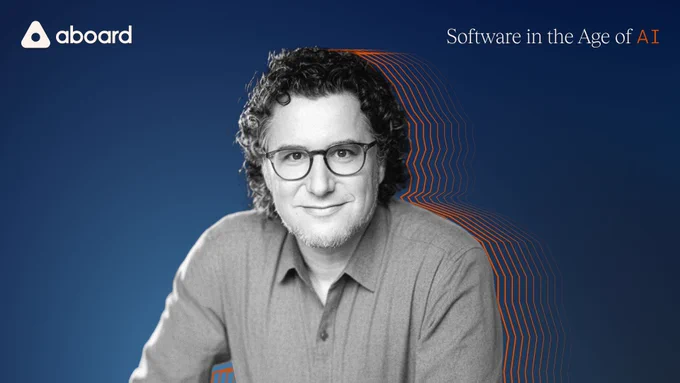 Black and white image of Eric with orange silhouette lines around his head, set against a navy background. Aboard logo in white in top corner; "software in the age of AI" in white and orange in opposite top corner.