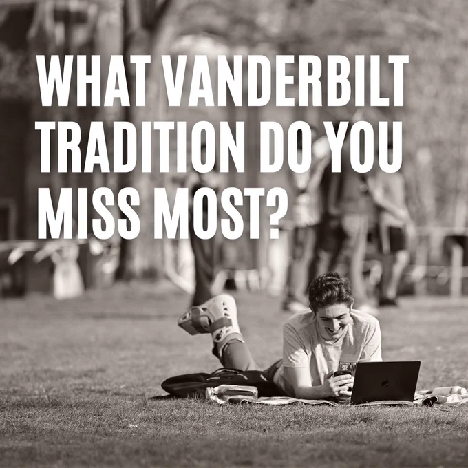 A person is lying on grass on alumni lawn at Vanderbilt University, smiling at a laptop. The image features the large, bold text: "What Vanderbilt tradition do you miss most?" The background shows blurred trees and people.