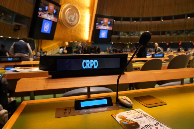 A nameplate showing CRPD in the General Assembly Hall.