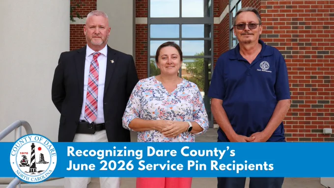 Troy, Angie and Shawn stand together. Text overlay reads: Recognizing Dare County’s
June 2026 Service Pin Recipients