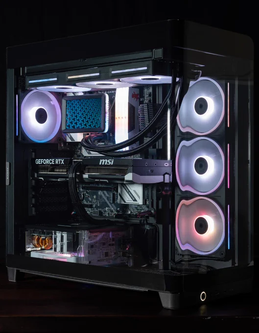 An image of black CORSAIR 4500X case, featuring new the new TITAN II ULTRA AIO and HX1000i SHIFT Crystal.  The background is dark, making the colors of the fans and interior much more intense in brightness and color. 