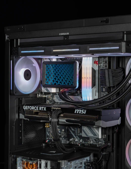 An image of black CORSAIR 4500X case, featuring new the new TITAN II ULTRA AIO and HX1000i SHIFT Crystal.  The background is dark, making the colors of the fans and interior much more intense in brightness and color. 