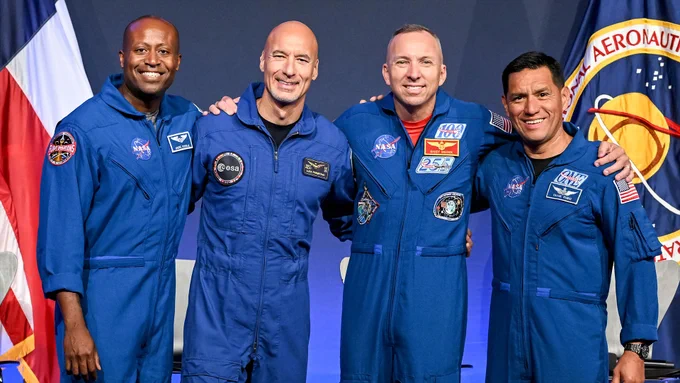 The Artemis III crew, including commander Randy Bresnik of NASA (second from right), pilot Luca Parmitano with the European Space Agency (second from left) and mission specialists Andre Douglas (at left) and Frank Rubio, both of NASA. (NASA/Robert Markowitz)
