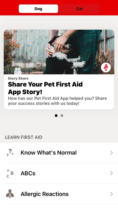 A person holding a black and white dog in a yard. The screen displays the "Share Your Pet First Aid App Story!" section, encouraging users to share experiences with the app. Below are options to learn first aid topics, including "Know What's Normal," "ABCs," and "Allergic Reactions."