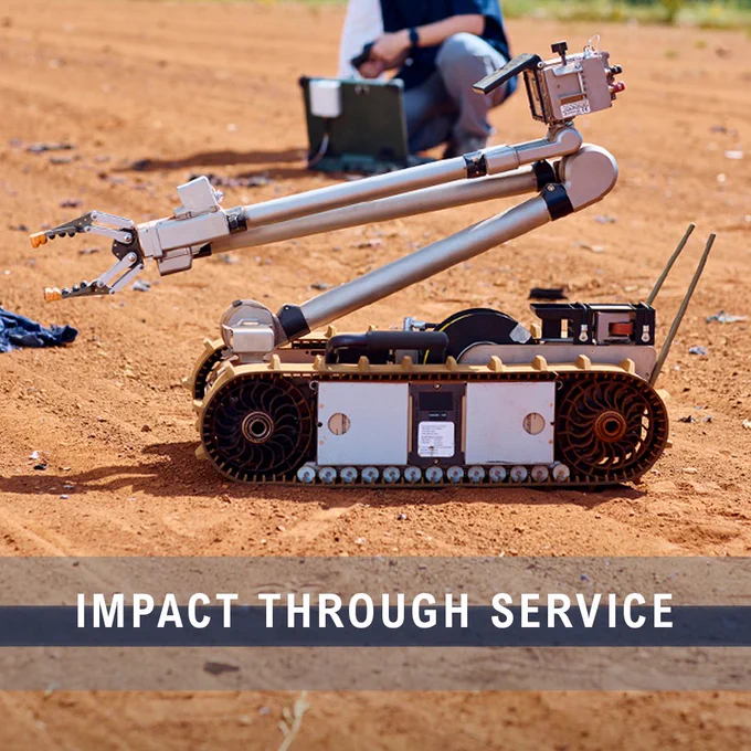 Image of robot. Impact Through Service. FBI Jobs logo.