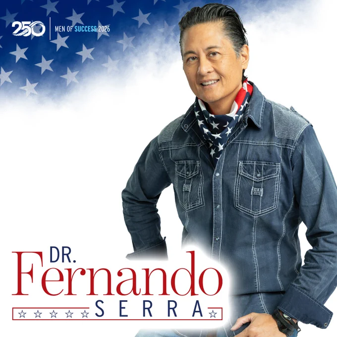 Portrait of Dr. Fernando Serra with patriotic elements. He wears a denim shirt and an American flag-themed scarf, exuding confidence and style.