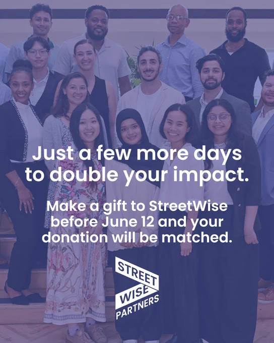 Diverse group of smiling professionals standing together promoting a donation matching campaign for StreetWise Partners.