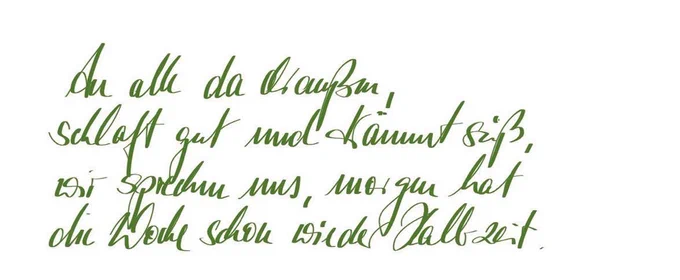 Handgeschriebener Abendgruß: an alle da draußen, schlaft gut und träumt süß, wir sprechen uns, morgen hat die Woche schon wieder Halbzeit. In grüner Schrift.