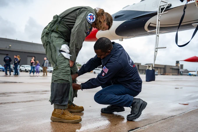 The Academy’s Civilian Instructor of the Year gets her uniform properly fitted out on the flightline.