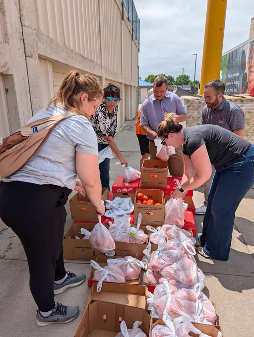 NPPS staff and volunteers sorting food for mobile food pantry.