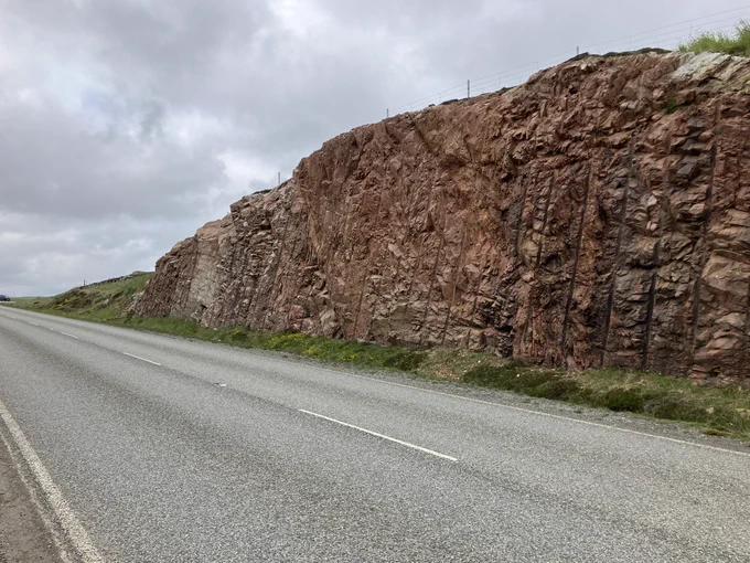 The northern part of a cutting on the A970 near Mavis Grind showing vertical strata