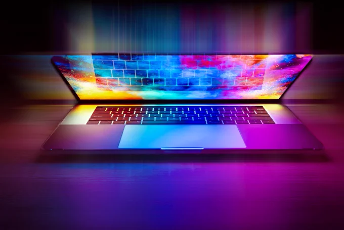 This image shows a glowing computer half closed.