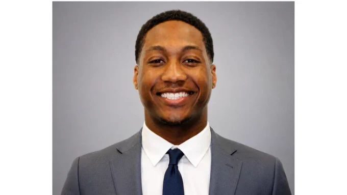 A headshot of AJ McKinney