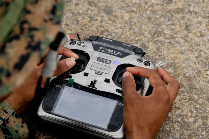 U.S. Marines with 3rd Battalion, 7th Marine Regiment, forward deployed with 4th Marine Regiment, 3rd Marine Division as a part of the Unit Deployment Program, fly Neros Archer first-person view drones on Camp Schwab, Okinawa, Japan, May 22, 2026. This training sharpened their ability to operate advanced FPV drones that provide reconnaissance and precision strike capabilities. (Photo by U.S. Marine Corps Lance Cpl. Haley Munoz)\n\n