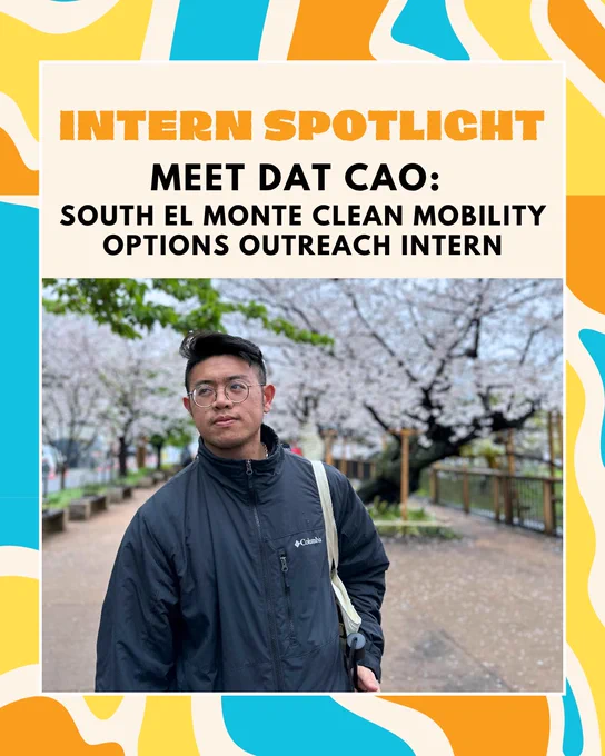 This image features an individual standing on a pathway lined with cherry blossom trees. They are wearing glasses and a dark jacket, with a bag over their shoulder. The background has a decorative border with bold colors, and text reads: "Intern Spotlight. Meet Dat Cao: South El Monte Clean Mobility Options Outreach Intern."