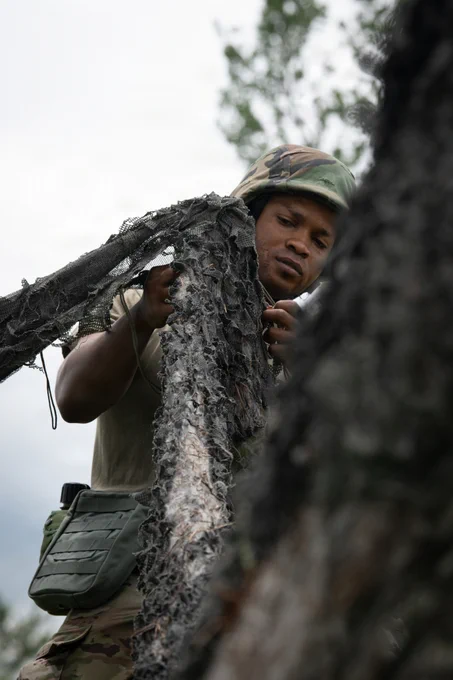 A 138th Fighter Wing Airman assists in building a bunker during a Combat Readiness Exercise at Camp Gruber, Okla., June 5, 2026. The 138th Fighter Wing simulated performing operations in a deployed environment, emphasizing unit readiness and cohesion. (Oklahoma Air National Guard photo by Senior Airman Christian Corley)
