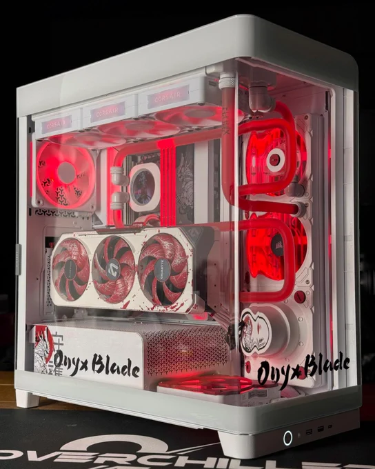 An image of an all white and red 4500X build, featuring a vertically mounted GPU and SHUGO DDR5 RAM. 