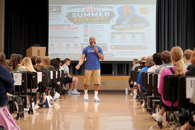 Director of Community Education Darrell Young speaking to his staff at a Summer Kickoff event