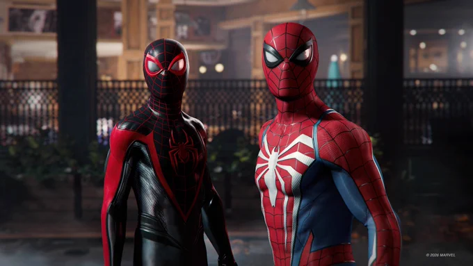 Peter Parker and Miles Morales standing shoulder-to-shoulder. 